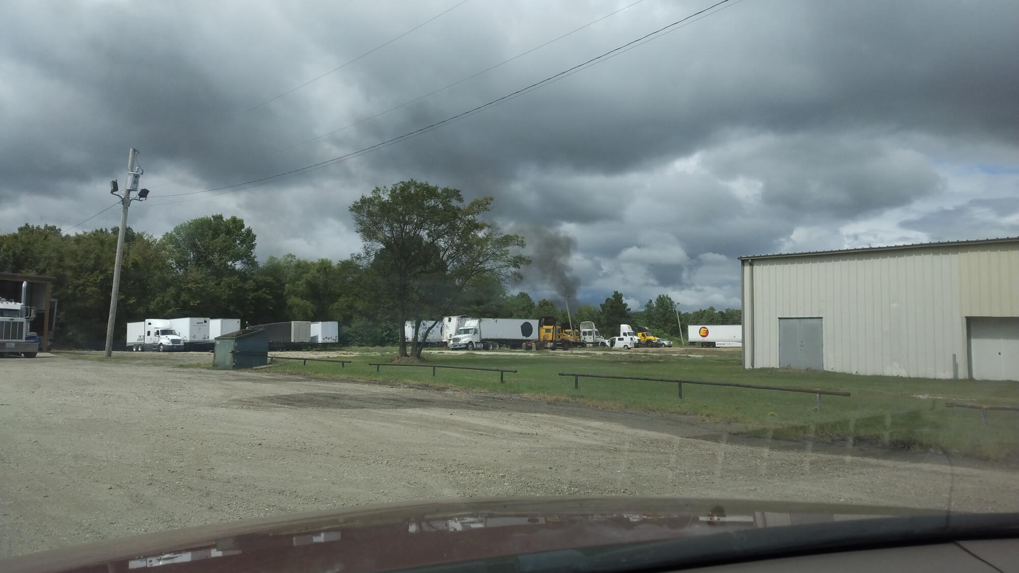 Column of smoke seen rising from behind Hempstead County shop at noon