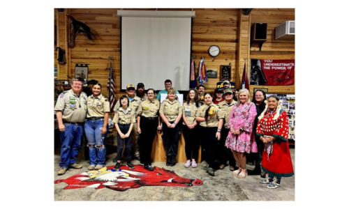 Cherokee Nation member Judy Davis teaches Scout Troop 5 Cherokee words, songs and dances.